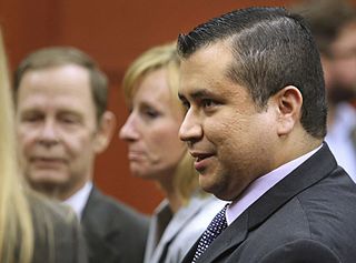 George Zimmerman leaves court with his family after Zimmerman's not guilty verdict was read in Seminole Circuit Court in Sanford, Florida, July 13, 2013.